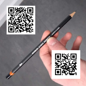 A picture of a pencil held in a hand with two QR codes overlaid on top of it