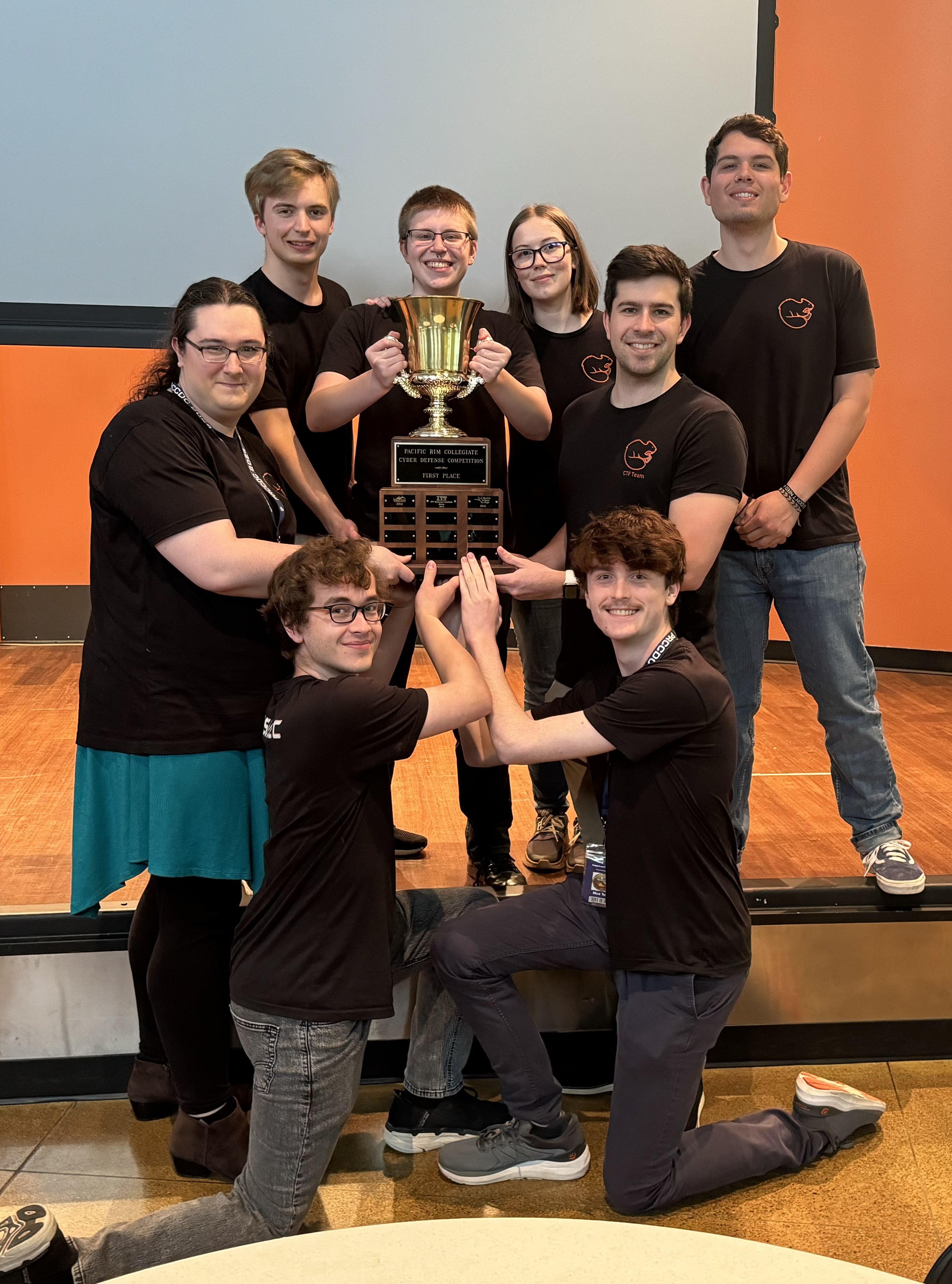 Members of OSUSEC’s CDC Team holding the travelling trophy